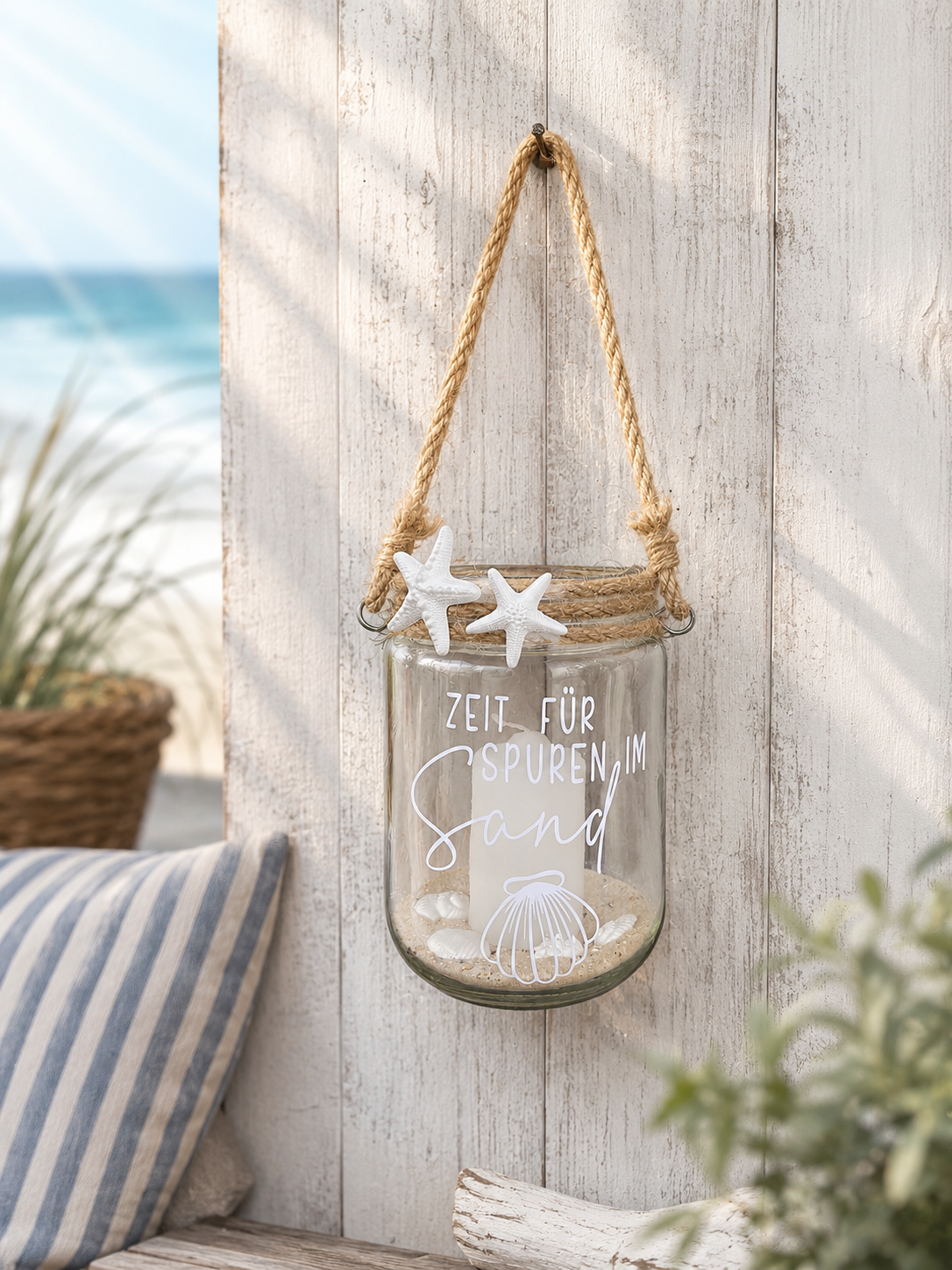 Windlicht Spuren im Sand